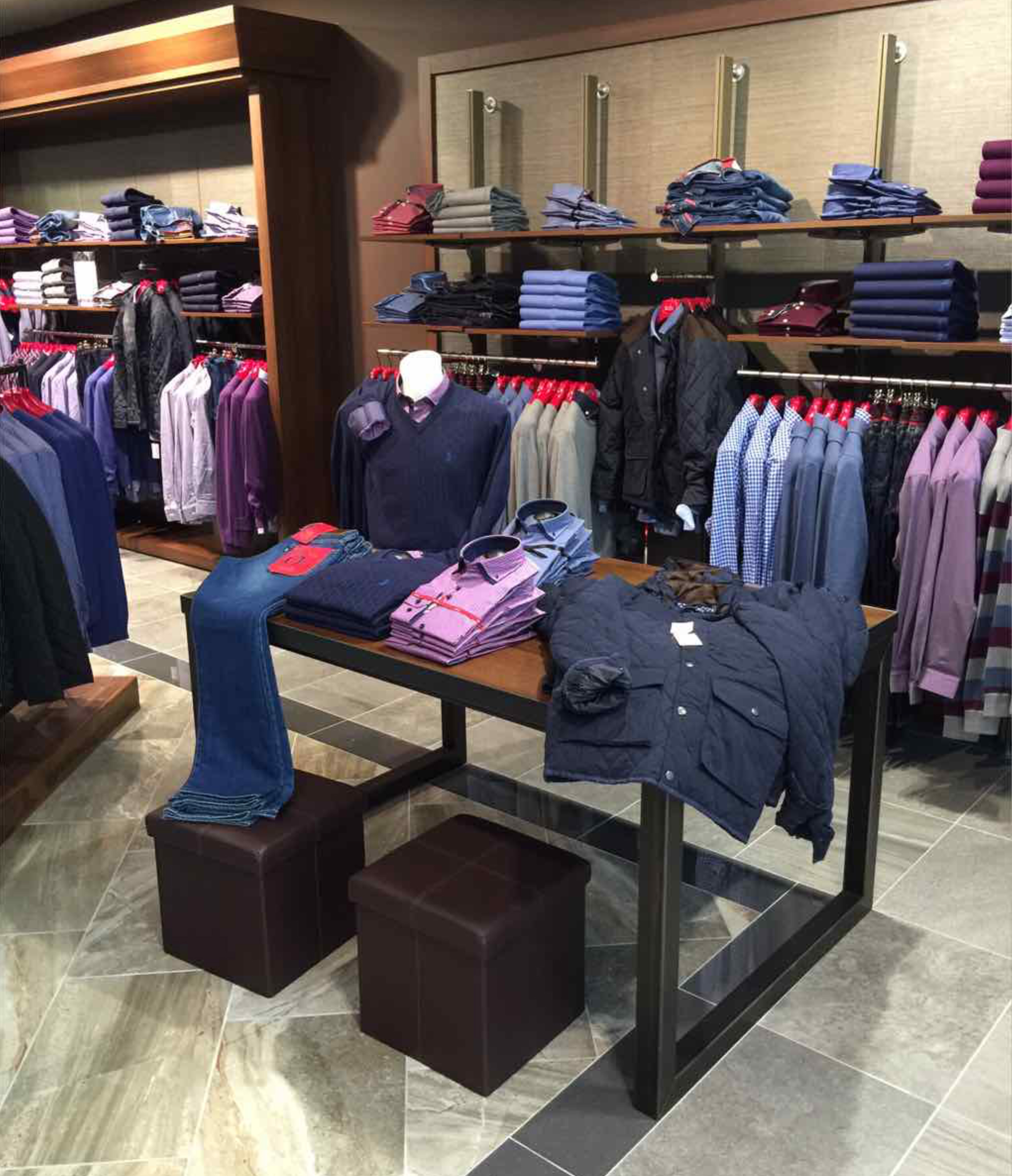 Display table with shirt and jeans menswear 